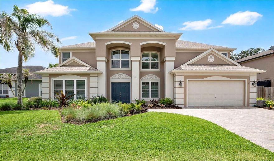 Welcome to this stunning 2-story executive pool home offering exceptional curb appeal with lush landscaping and paver driveway. Nestled in a quiet cul-de-sac, this beautifully renovated residence combines luxury design with comfortable living.
Step inside to an open-concept floorplan featuring soaring ceilings and a dramatic stacked-stone fireplace wall that extends to the ceiling, creating a striking focal point in the living area. Designer finishes and thoughtful upgrades are showcased throughout the home.
The gourmet kitchen is a chef’s dream, complete with premium features, abundant workspace, and stylish finishes that make both entertaining and everyday living effortless.
The luxurious first-floor primary suite offers a true retreat with a spa-inspired bathroom designed to impress. Enjoy dual walk-in closets, a relaxing spa tub, and an oversized walk-in shower with high-end finishes.
Upstairs, you’ll find four additional spacious bedrooms, two full bathrooms, and a large open loft area perfect for a media room, game room, home office, or additional living space.
Step outside to your own private backyard oasis featuring a beautiful pool, ideal for relaxing or entertaining year-round. Located in an unbeatable area, this home is zoned for highly sought-after Lake Mary schools and offers easy access to I-4 for convenient commuting.
This exceptional home combines luxury, comfort, and location in one extraordinary package. Call today for your private showing