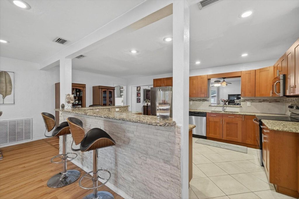 Photo of 420 Lewis Boulevard SE, St Petersburg, FL 33705 (MLS # TB8419501)