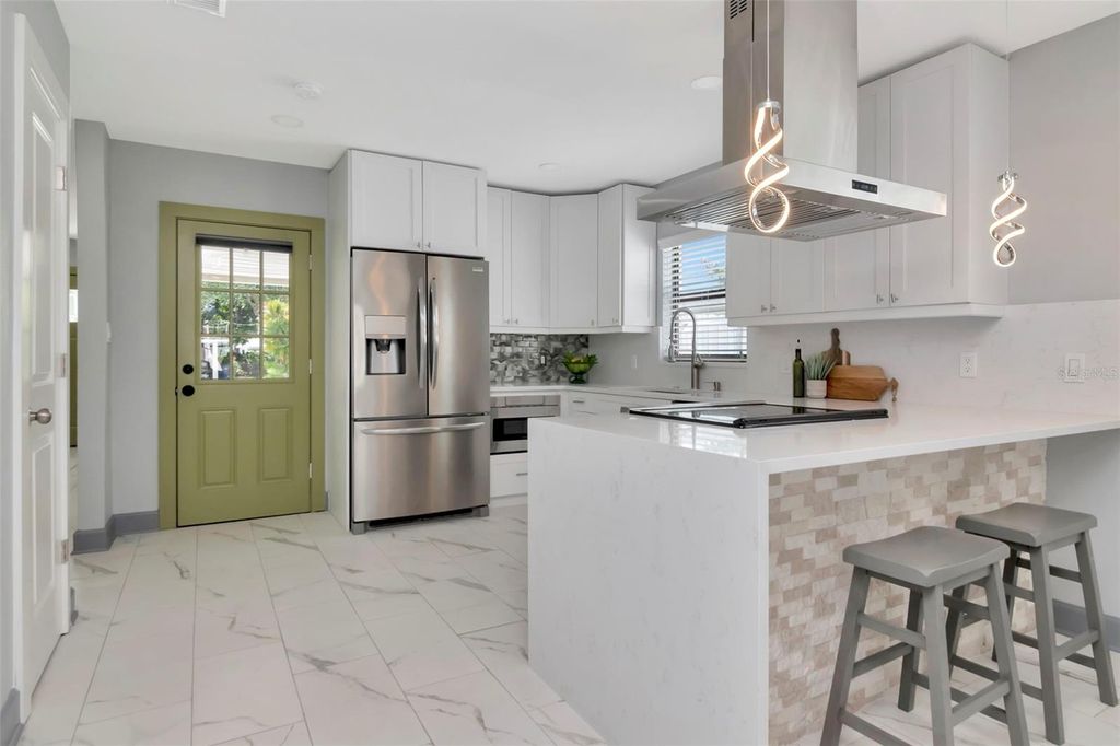 Photo of 1713 W Saint Isabel Street, Tampa, FL 33607 (MLS # TB8510576)