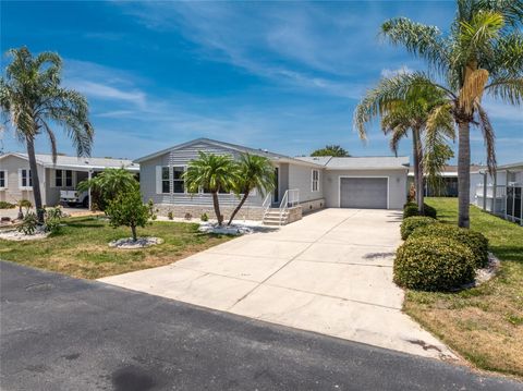 Photo of 9209 Pinehaven Way, Englewood, FL 34224 (MLS # D6142443)