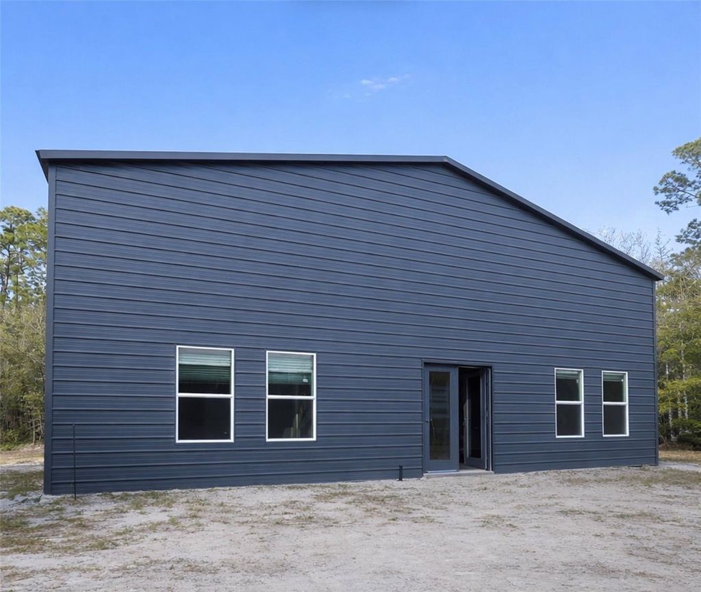 Photo of 425 Western Road, New Smyrna Beach, FL 32168 (MLS # NS1087372)