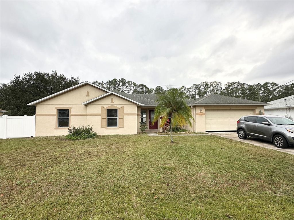 Photo of 45 Reidsville Drive, Palm Coast, FL 32164 (MLS # FC314421)