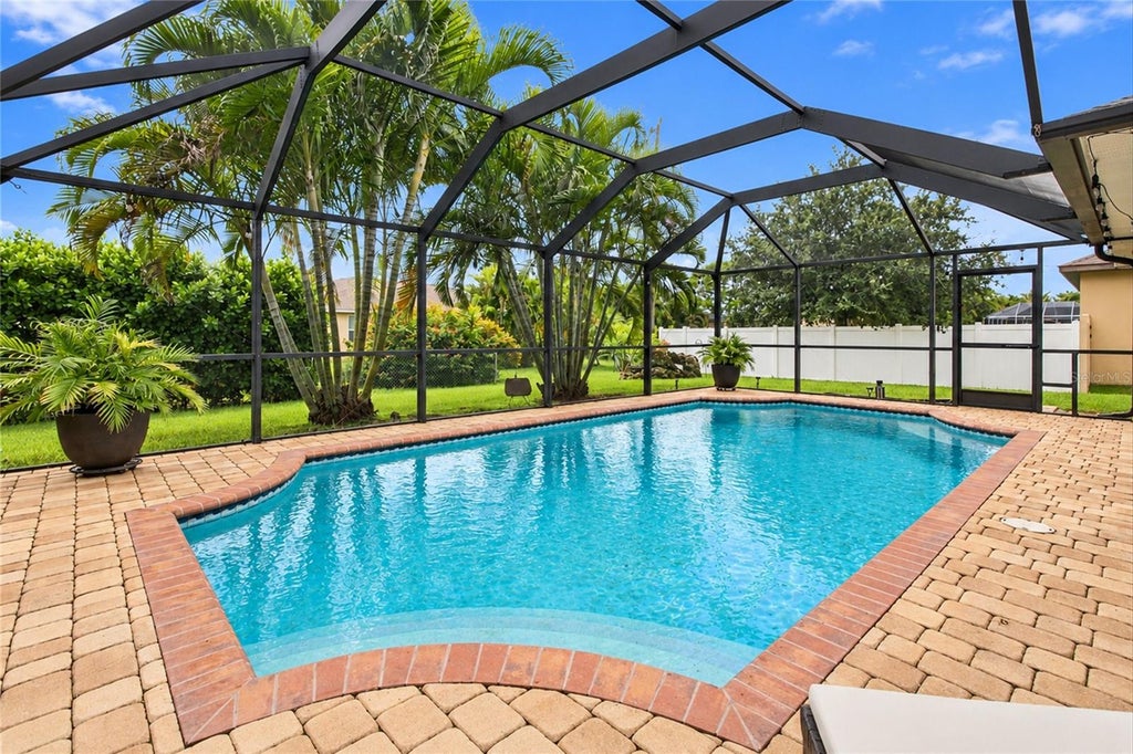 Photo of 1412 SW 43rd Terrace, Cape Coral, FL 33914 (MLS # C7531634)