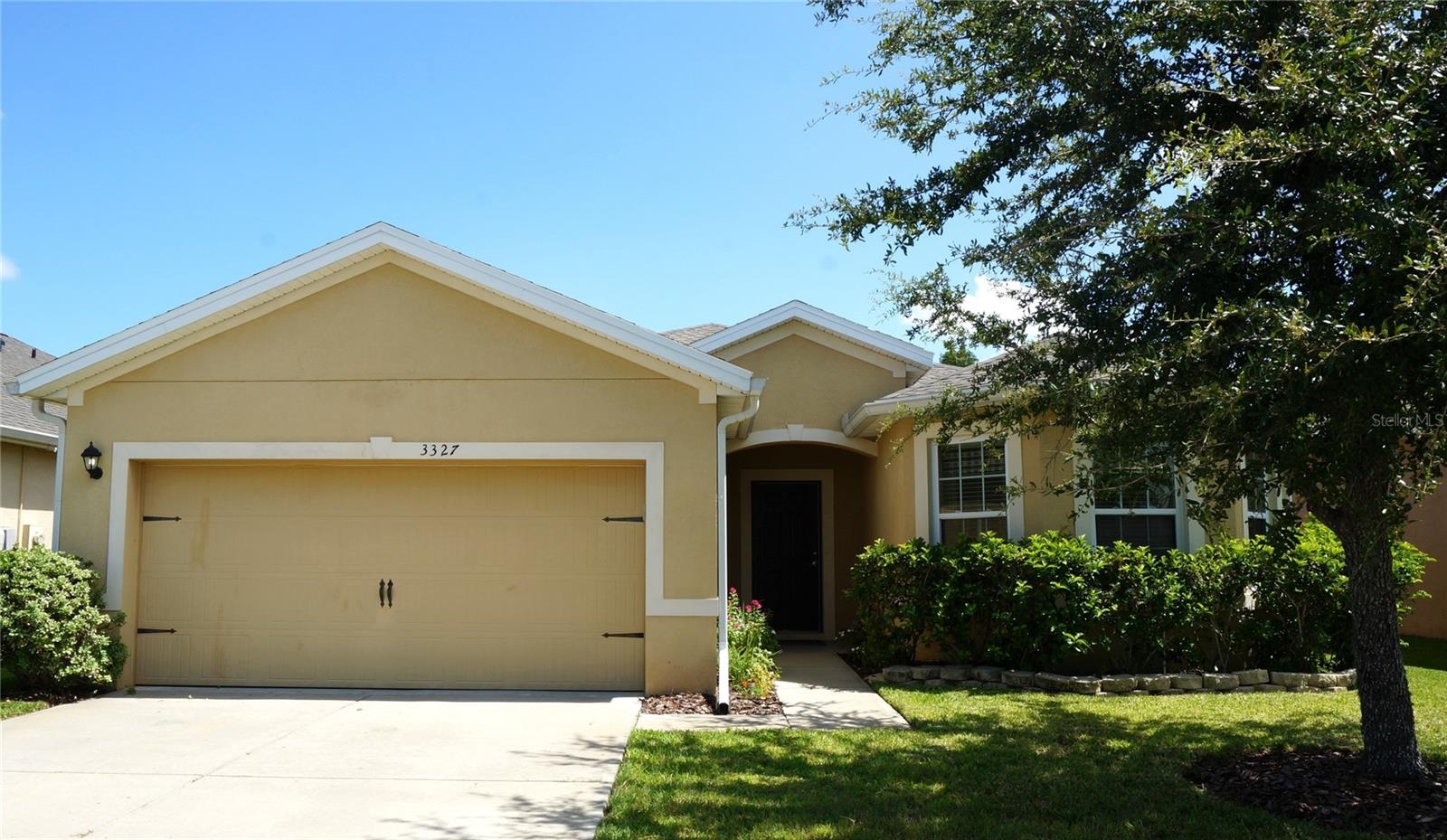 Look no further! This well-maintained, modern home offers a split floorplan, screened patio, and fenced in backyard. Three bedrooms, two bathrooms, a bright living space, stone countertops, AND a private master suite. Built in 2016, this home is the one you've been looking for! NEW roof installed in 2025 as well as vinyl flooring throughout the common areas. Community amenities include a pool, fitness center, clubhouse, playground, and sidewalks throughout the neighborhood. Low HOA and no CDD! Ideal for families or anyone seeking a move-in ready property in a friendly neighborhood. Conveniently located minutes from the Polk Parkway as well as I-4.