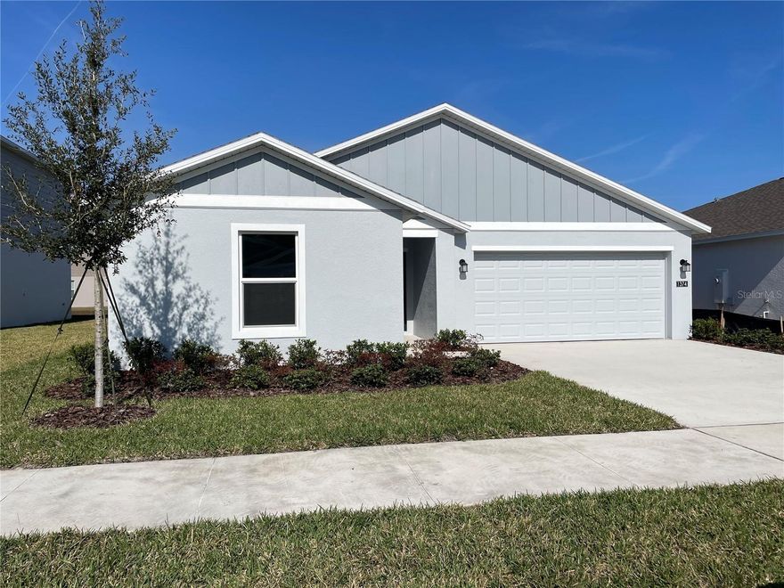 Step into a brand-new home in the heart of Deland’s charming and established Oak Hammock community. This never-lived-in Celeste floor plan blends modern style with classic comfort, offering a fresh start in a neighborhood known for its quiet streets, natural beauty, and warm sense of community.

Inside, a bright foyer opens to a spacious, open-concept living area that brings everyone together. The family room flows into a cozy dining space, a beautifully designed kitchen, and a covered patio—an effortless layout perfect for everyday living. The owner’s suite sits privately in its own corner with an adjoining bath, while three additional bedrooms on the opposite side create comfortable retreats for family, guests, or work-from-home needs.

This home comes fully outfitted with the builder’s signature Everything’s Included touches—brand-new energy-efficient appliances, quartz countertops throughout, oversized tile in all main areas, and soft carpeting in the bedrooms. Thoughtful green building features add value and help you save while living more sustainably.

Life in Oak Hammock means enjoying a peaceful, established setting with amenities designed for connection and outdoor fun. Residents have access to a playground and multi-use trails, all within minutes of Stetson University, Blue Springs State Park, local parks, and convenient routes to Central Florida, Orlando, and area attractions.

A fresh home in a beautiful community—ready for immediate move-in.
Please note: No pets are permitted in this rental.