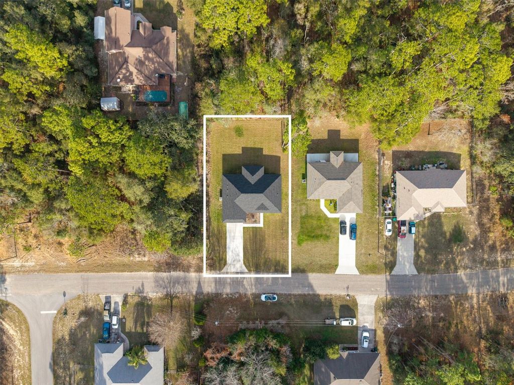 Photo of 9299 N Tahiti Way, Citrus Springs, FL 34433 (MLS # O6373216)