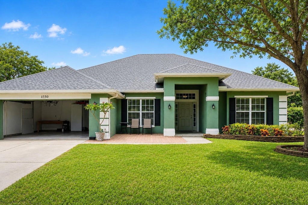 Photo of 1555 Blue Sky Boulevard, Haines City, FL 33844 (MLS # TB8544728)