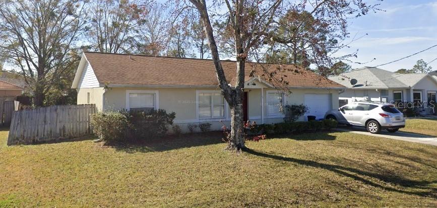 This well-maintained 3-bedroom, 2-bath home offers 1,148 square feet of inviting living space in the heart of Palm Coast. This cozy home could make the perfect Starter Home for a couple looking to start a family. It would also work great for retirees looking to downsize in the quiet city of Palm Coast. Enjoy a spacious primary suite with an en-suite bathroom, two additional bedrooms ideal for family, guests, or a home office, and a second full bathroom for added convenience. Outside, the property includes a private backyard with room to relax, garden, or enjoy the Florida sunshine. Located in a quiet, established neighborhood just minutes from shopping, dining, parks, and Flagler Beach, this home is perfect for first-time buyers, retirees, or anyone seeking a laid-back coastal lifestyle.