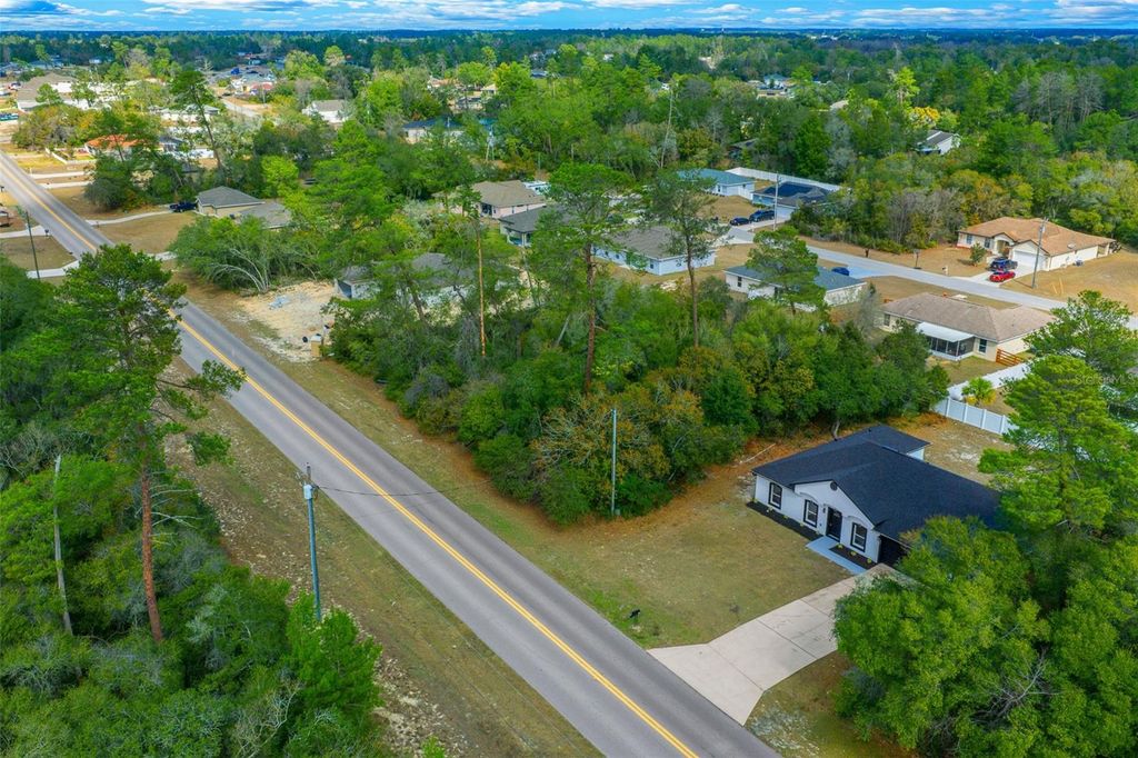 Photo of 497 Marion Oaks Lane, Ocala, FL 34473 (MLS # OM717403)