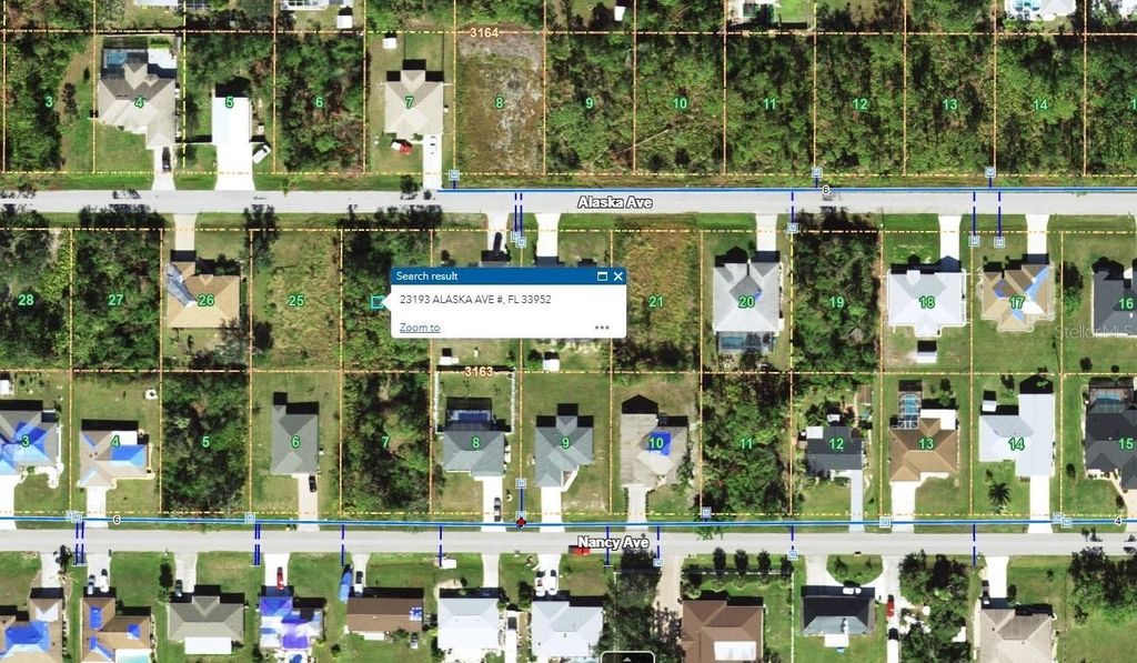 Photo of 23193 Alaska Avenue, Port Charlotte, FL 33952 (MLS # C7513011)