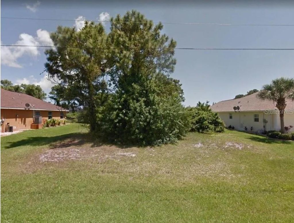 Photo of 71 Par View Road, Rotonda West, FL 33947 (MLS # O6327989)