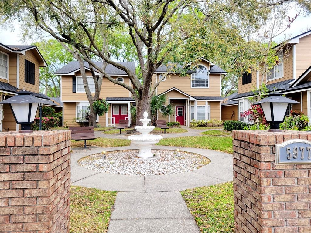 Photo of 5977 Braemar Place #106, Orlando, FL 32822 (MLS # O6396101)