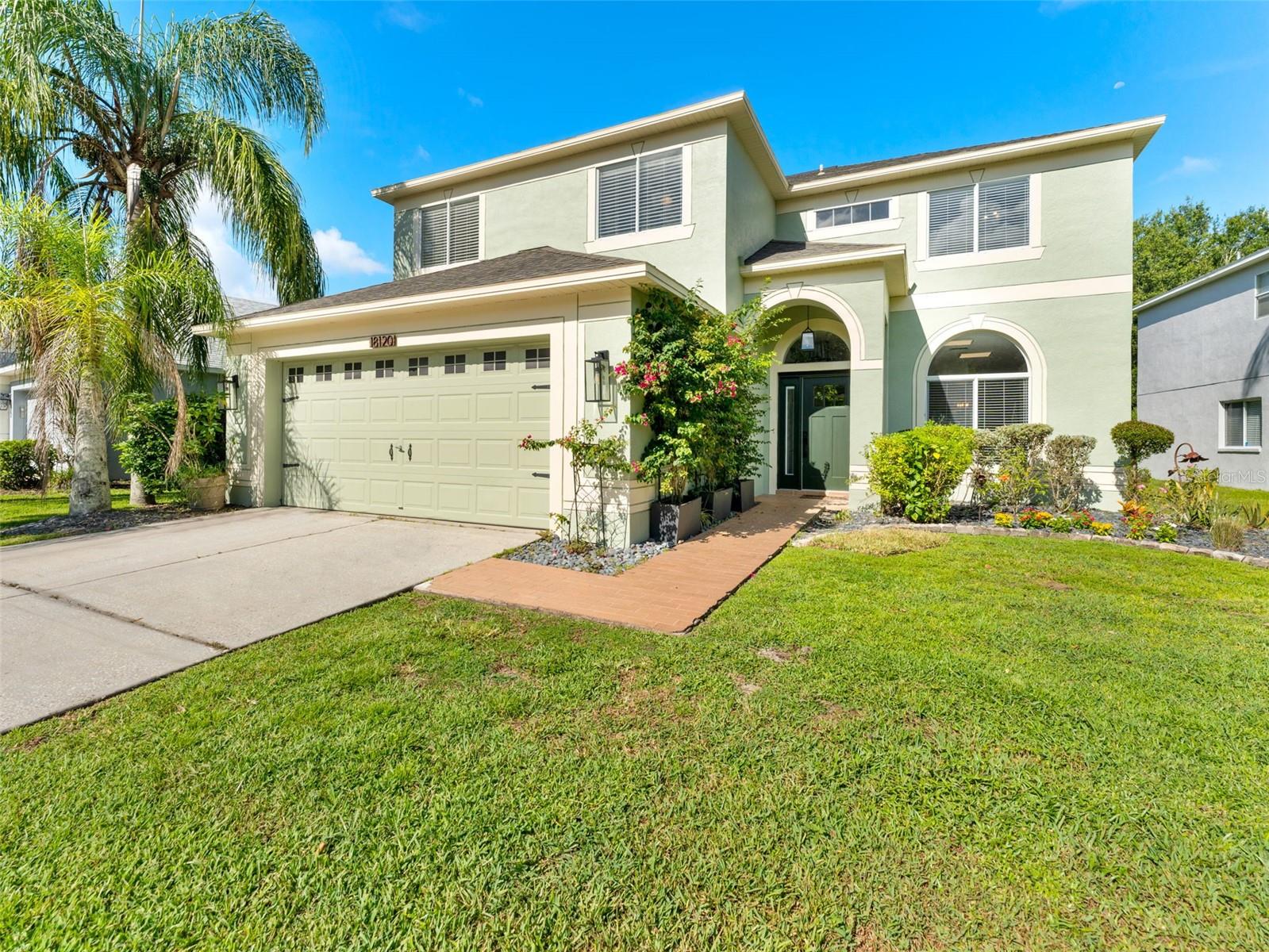 Welcome to the well established Heritage Isles golf community! Driving into the neighborhood you notice the peaceful backdrop, where trees, nature, and quiet abound. In this two-story, 6-bedroom, 3.5 bathroom home, every detail has been considered-both for beauty and for living well. With its vibrant floral landscaping, conservation woodland views stretching front and back, and sidewalk-lined streets, the setting alone sets it apart.
Inside a light-filled layout invites you into the home updated with warm engineered hardwood and ceramic tile flooring, flowing easily between formal and casual spaces. The remodeled kitchen is a centerpiece–quartz countertops, a gas stove, a generous pantry, custom shelving designed for both function and show. The adjacent family room and dinette open to nature itself–private, with no rear neighbors, and the quiet hum of conservation land, ideal for both entertaining and everyday life.
Downstairs, the primary suite offers luxurious retreat vibes, a large walk-in closet, and a freshly updated en-suite bath. Upstairs? It’s the ultimate family zone—five spacious bedrooms thoughtfully laid out and a huge bonus room that can flex into a game room for billiards or table tennis, media space, think home theatre and VR competitions or even a second living room. The entire home received remodeling and updating in 2021. Recent updates include exterior paint (2025), new washer and dryer (2023), and refreshed front landscaping (2025). The fenced yard, extended driveway, and two-car garage add practical touches that make life easier.
Tucked away in one of New Tampa’s most sought after communities, you’ll enjoy resort style amenities including a pool, gym, tennis, trails, and an 18-hole course—all minutes from shopping, dining, I-75, and I-275. Zoned for top-rated schools and close to all the needs for everyday living, this home simply makes sense! Set up your personal showing and see why this home is an invitation to live expansively, surrounded by beauty.