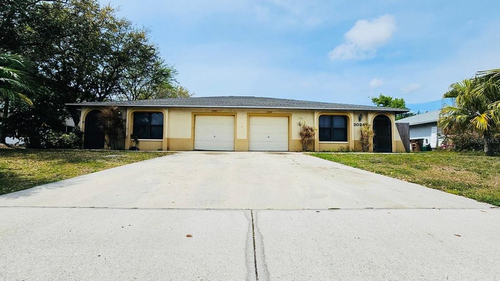 Photo of 3026 Santa Barbara Boulevard, Cape Coral, FL 33914 (MLS # TB8489959)