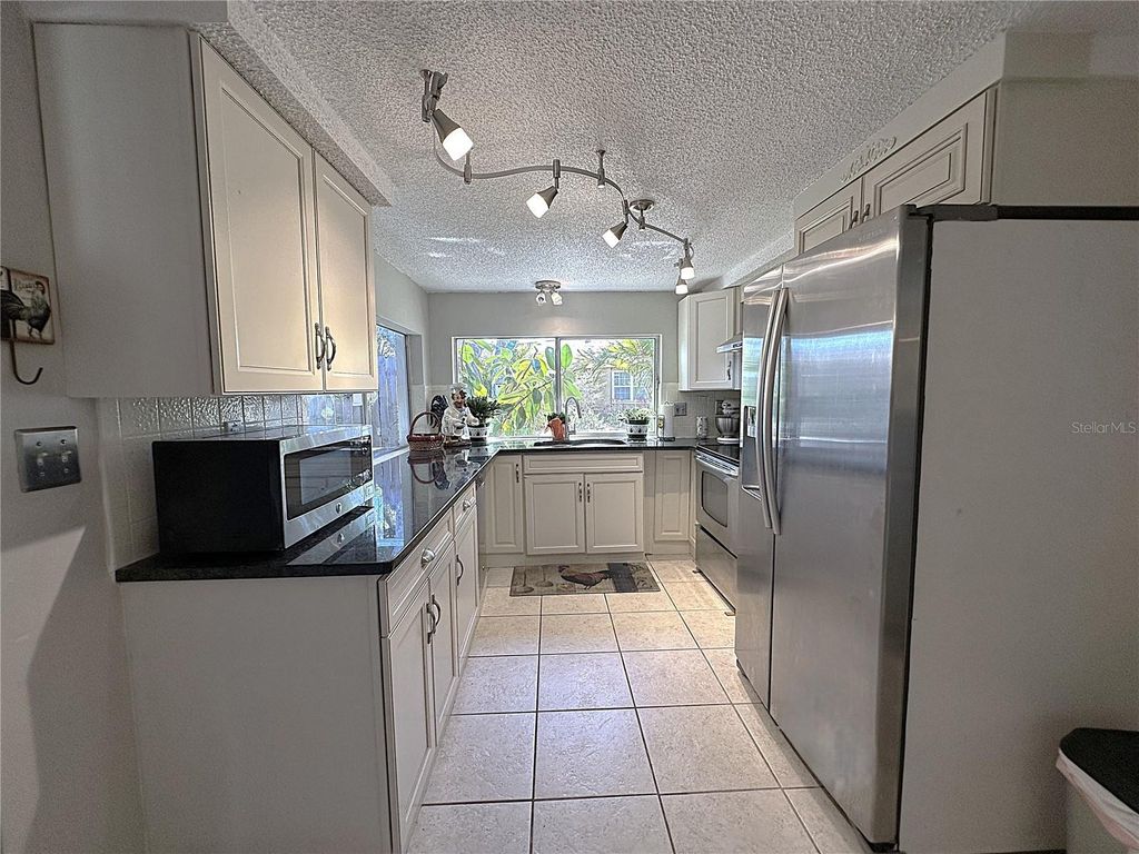 Photo of 8200 Mill Creek Lane, Hudson, FL 34667 (MLS # TB8461188)