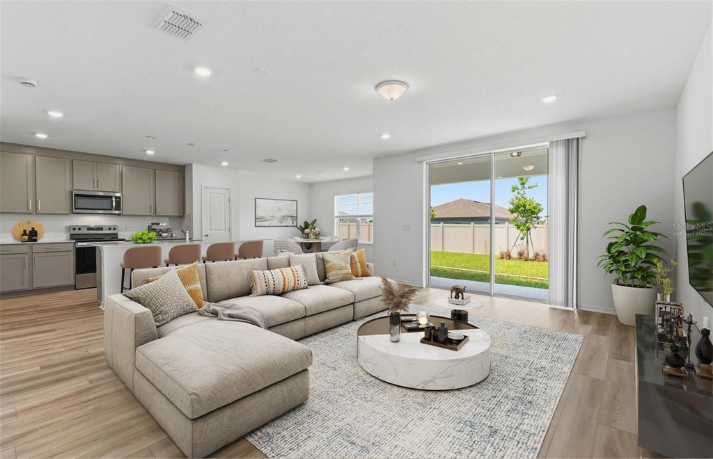 Photo of 16813 Harmony River Lane, Parrish, FL 34219 (MLS # TB8555852)
