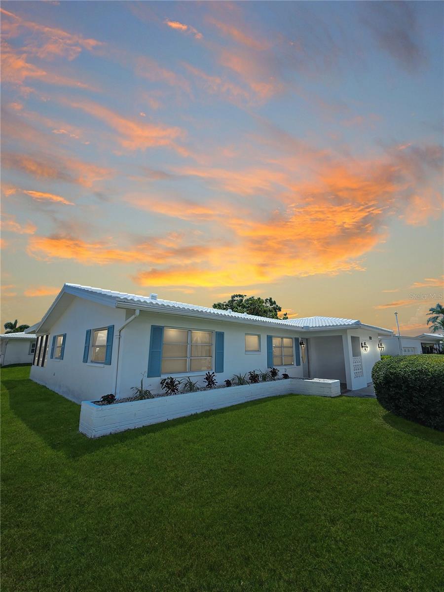 Looking for an updated move in ready home in the Mainlands? Look no further! This home has a New Kitchen with tall soft close cabinets and Granite countertops with a stainless-steel sink and garbage disposal. New 4-piece stainless appliance set. New updated bathrooms with custom tile and new vanities and toilets. New Barn Door bathroom door. New Doors throughout the home. New LVP flooring throughout the entire home. New Lighting throughout the home including new ceiling fans in each room. New AC unit in the enclosed Florinda room. New window blinds. The Interior and the Exterior including the Tile roof were painted last month. The Central AC system was recently installed 3 years ago 3/22. New Tile Roof on 01/2019. Driveway was widened in 2017. Close to community amenities. HOA covers the Roofs and exterior painting. Roof is covered by Maintenance Fee if need to repair or replace due to age. See Rules & Regs at www.themainlands.com Unit 4. Large corner lot. The color of the shutters can be changed if the buyer desires another color. Move in Ready!
The Mainlands community’s low $450/month association fee covers essential services like cable, Internet, water, sewer, trash, and exterior maintenance, along with lawn care, allowing you to enjoy a maintenance-free lifestyle. The Mainlands community enhances your lifestyle with a rich array of weekly activities that encourage social engagement and leisure, including a sparkling pool and shuffleboard courts for friendly competitions. Just 10 miles away, you’ll find some of the world’s most famous Gulf beaches, perfect for soaking up the sun and enjoying breathtaking sunsets. Don’t miss your chance to embrace the fun and vibrant lifestyle that awaits you in this wonderful community! Whether you’re looking to unwind or stay active, this home is your hole in one sanctuary. Schedule your private showing today!