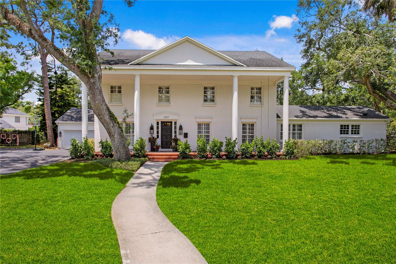 Welcome to this stunning historic brick home nestled in the highly sought-after neighborhood of Culbreath Bayou. Situated on an expansive,
nearly half-acre lot, this exceptional residence seamlessly blends classic charm with modern amenities. The first floor features a beautifully
updated eat-in kitchen, a cozy family room, a formal living room, a private office, and a massive entertainment room complete with a built-in bar
outfitted with a custom ice maker, dishwasher, and more — an entertainer’s dream. A guest bedroom and full bathroom on this level offer ideal
accommodations for visitors. Upstairs, the second floor offers two spacious bedrooms, a full bathroom with dual sinks, and a luxurious primary
suite with an elegantly appointed primary bathroom. The third floor adds even more versatility with an additional entertainment space, featuring
three built-in bunk beds — perfect for sleepovers and gatherings. Step outside into the private backyard oasis, which includes an outdoor kitchen
with a built-in grill, a large heated swimming pool, gym space, generous storage areas, and a sprawling green space complete with a putting
green — providing ample room for relaxation, play, and all your outdoor equipment. This rare opportunity combines timeless architecture,
spacious living, and resort-style amenities — all in one of Tampa’s most prestigious neighborhoods.