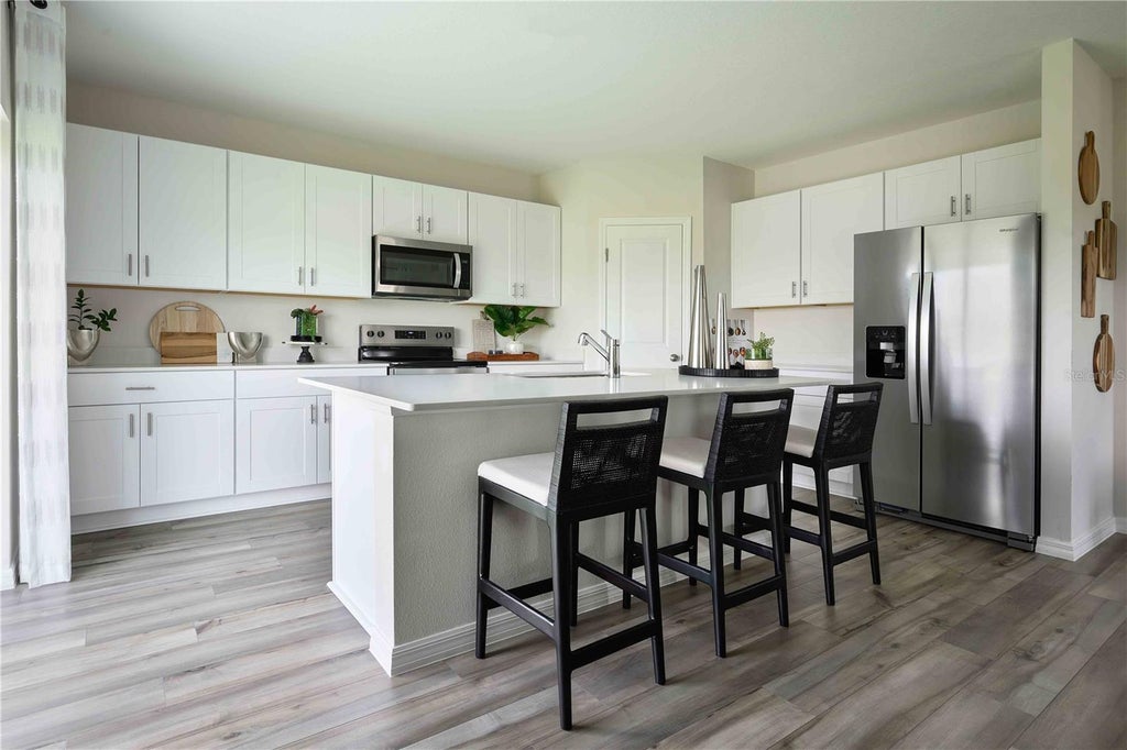 Photo of 1577 Sage Avenue, Haines City, FL 33844 (MLS # TB8525609)