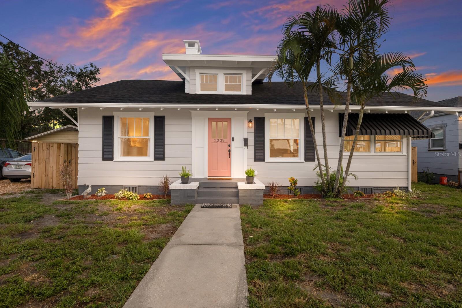 Timeless Charm Meets Modern Comfort in Historic Wares Creek! Step into this beautifully restored 100-year-old home where classic architecture meets contemporary elegance. Damaged during a recent storm (not flooding), this 2-bedroom, 2-bath residence (plus a bonus office space) has been thoughtfully renovated from top to bottom—retaining its historic appeal while offering the best of modern living. Every detail has been carefully considered, from the crown moldings and large baseboards to the pine window casings and fresh paint—bringing back the original charm but even better, because it’s all new! The kitchen and bathrooms recently refreshed with updated drywall, paint and new baseboards and crown molding throughout, blending seamlessly with the character of the home. Step outside to the inviting back porch, perfect for morning coffee or evening relaxation. Enjoy cozy Florida winter nights by the fire pit, outback. An inside laundry room adds convenience to your daily routine, while the charming dormer enhances the curb appeal of this classic beauty. A standout feature is the separate outbuilding, fully converted into a stylish office space with A/C and electric—ideal for working from home or pursuing hobbies. Nestled in the heart of Wares Creek, this home is surrounded by mature trees, sidewalks, and a welcoming community. Enjoy the neighborhood’s boat/kayak launch, community garden, and the vibrant downtown Farmers Market just minutes away. With easy access to shops, restaurants, and a quick 10-minute drive to SRQ Airport, this location truly has it all. Don’t miss your chance to own this piece of Wares Creek history—modernized for today’s lifestyle!