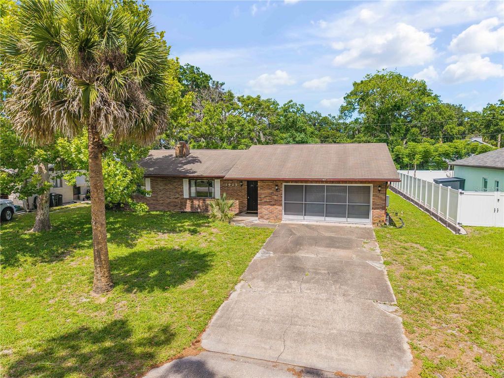 Photo of 1923 Sabal Palm Drive, Edgewater, FL 32141 (MLS # V4949203)