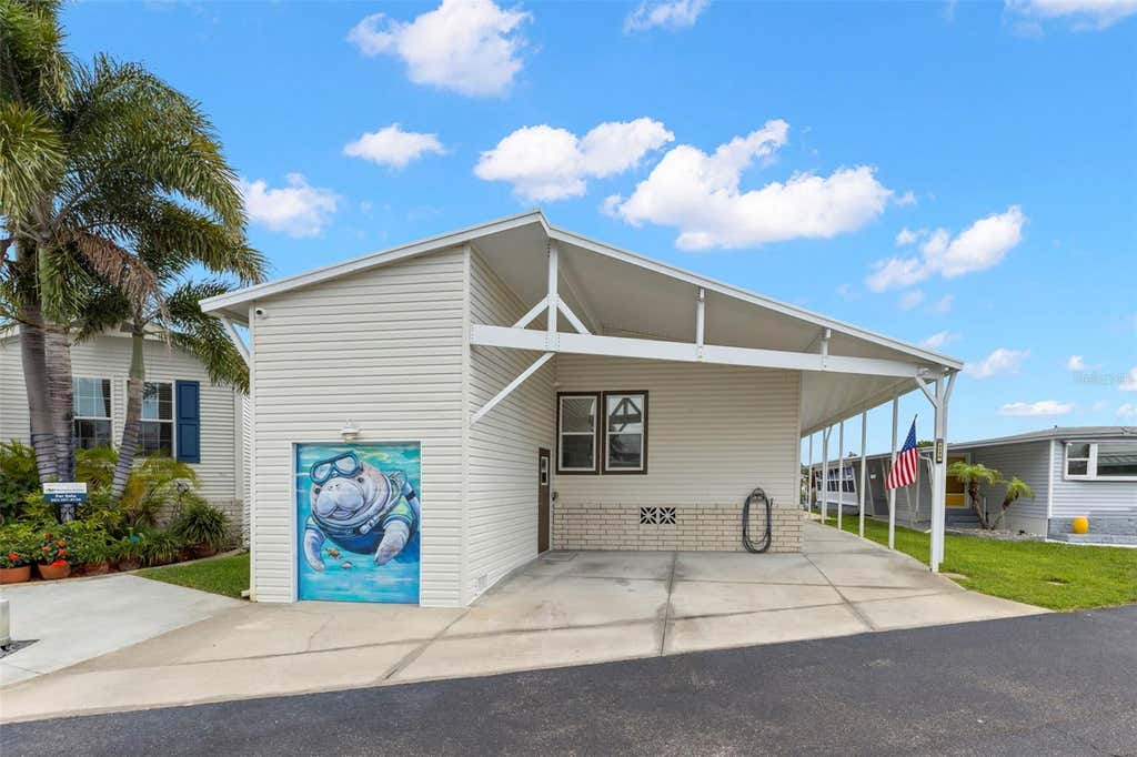Photo of 7174 Mount Arlington Drive NE #419, St Petersburg, FL 33702 (MLS # TB8514990)