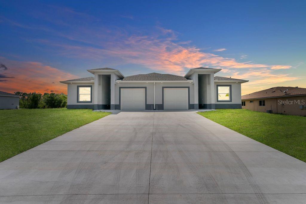 Discover the epitome of modern duplex living in this newly constructed investment masterpiece. Each meticulously crafted unit offers three bedrooms and two bathrooms, thoughtfully designed to maximize both comfort and functionality across an impressive living space. Step into a world where luxury meets practicality, as each residence showcases a stunning kitchen adorned with sophisticated Quartz countertops and premium stainless-steel appliances. The open-concept design creates an effortless flow between the living, dining, and culinary spaces, perfect for both intimate gatherings and grand entertaining. The generously proportioned bedrooms provide peaceful retreats, while the elegantly appointed bathrooms feature designer touches and premium Quartz surfaces. The primary bedroom suite offers a private sanctuary for relaxation and rejuvenation. Security meets sophistication with hurricane impact windows throughout, eliminating the need for additional storm protection while maintaining the property's sleek aesthetic. This thoughtful addition provides year-round peace of mind and enhanced energy efficiency. Positioned in a coveted neighborhood free from homeowners association restrictions, this residence offers the perfect blend of convenience and tranquility. The property sits outside flood zones and provides easy access to acclaimed educational institutions, vibrant shopping destinations, and major transportation arteries. Whether seeking an astute investment opportunity or a distinctive living space, this duplex presents an unmatched combination of style, function, and location. Experience the art of duplex living reimagined for the discerning resident.