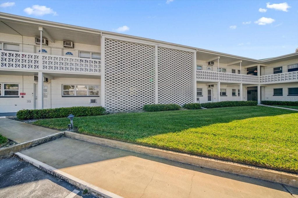 Photo of 7050 Sunset Way #6, St Pete Beach, FL 33706 (MLS # O6364224)