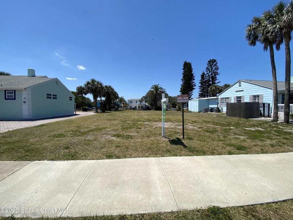 Photo of 118 N Atlantic Avenue, Cocoa Beach, FL 32931 (MLS # V4946852)