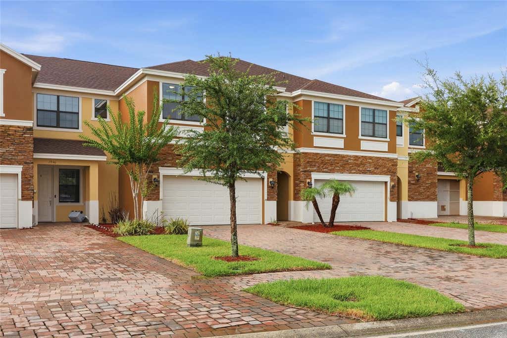 Photo of 1940 Portofino Meadows Boulevard, Orlando, FL 32824 (MLS # O6419006)