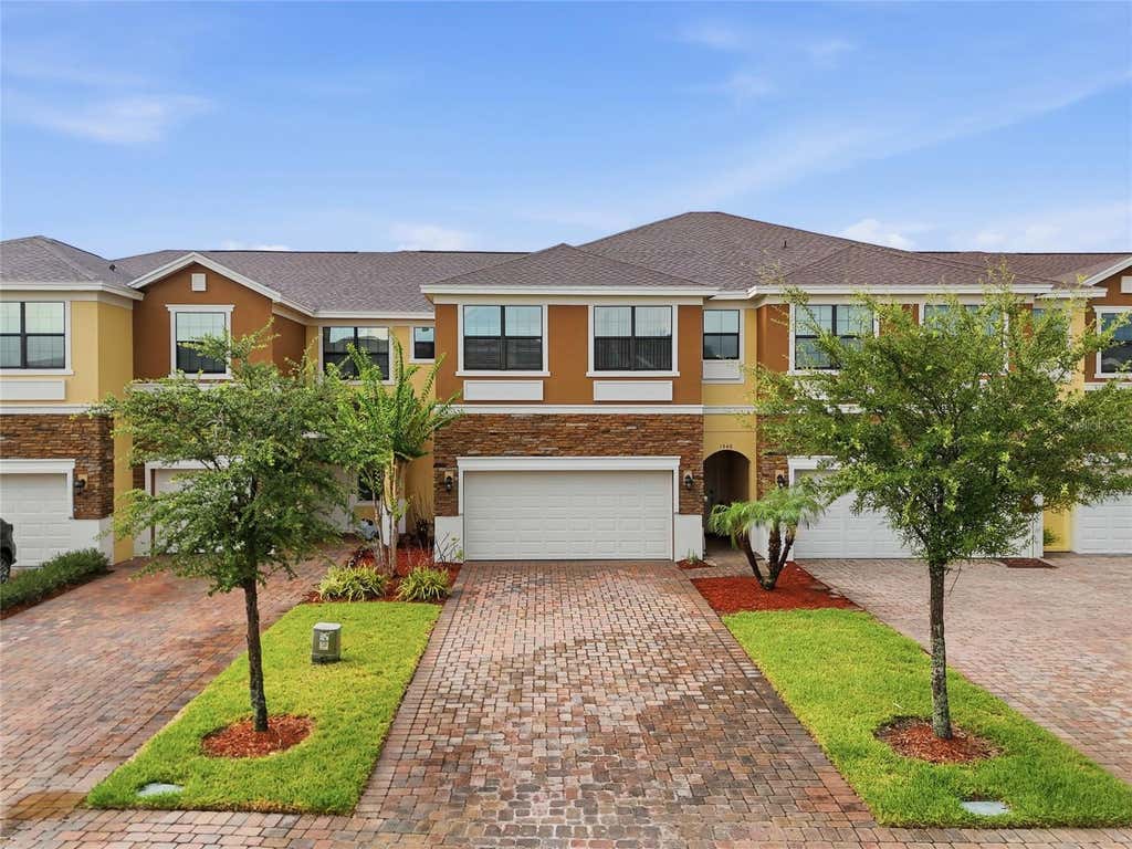 Photo of 1940 Portofino Meadows Boulevard, Orlando, FL 32824 (MLS # O6419006)