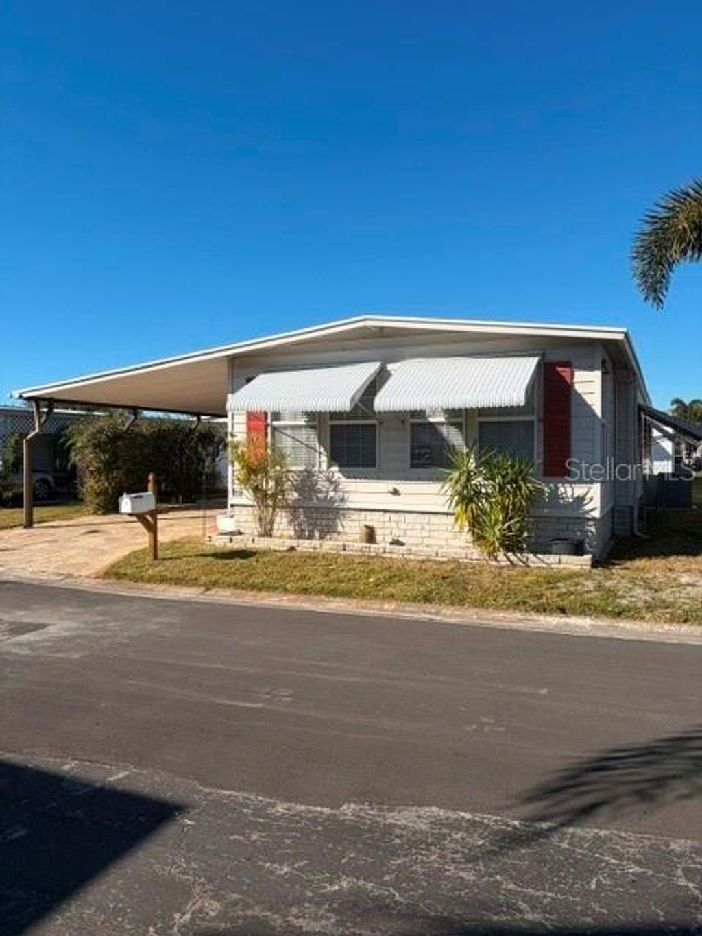 Photo of 10461 Peaceful Drive, Largo, FL 33773 (MLS # TB8474278)