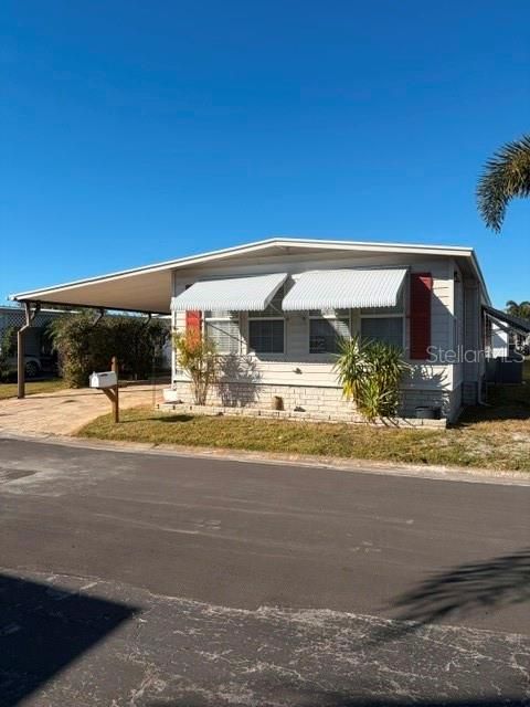 Photo of 10461 Peaceful Drive, Largo, FL 33773 (MLS # TB8474278)