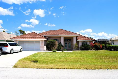 Photo of 76 Sportsman Road, Rotonda West, FL 33947 (MLS # D6141659) Photo of 76 Sportsman Road, Rotonda West, FL 33947 (MLS # D6141659)