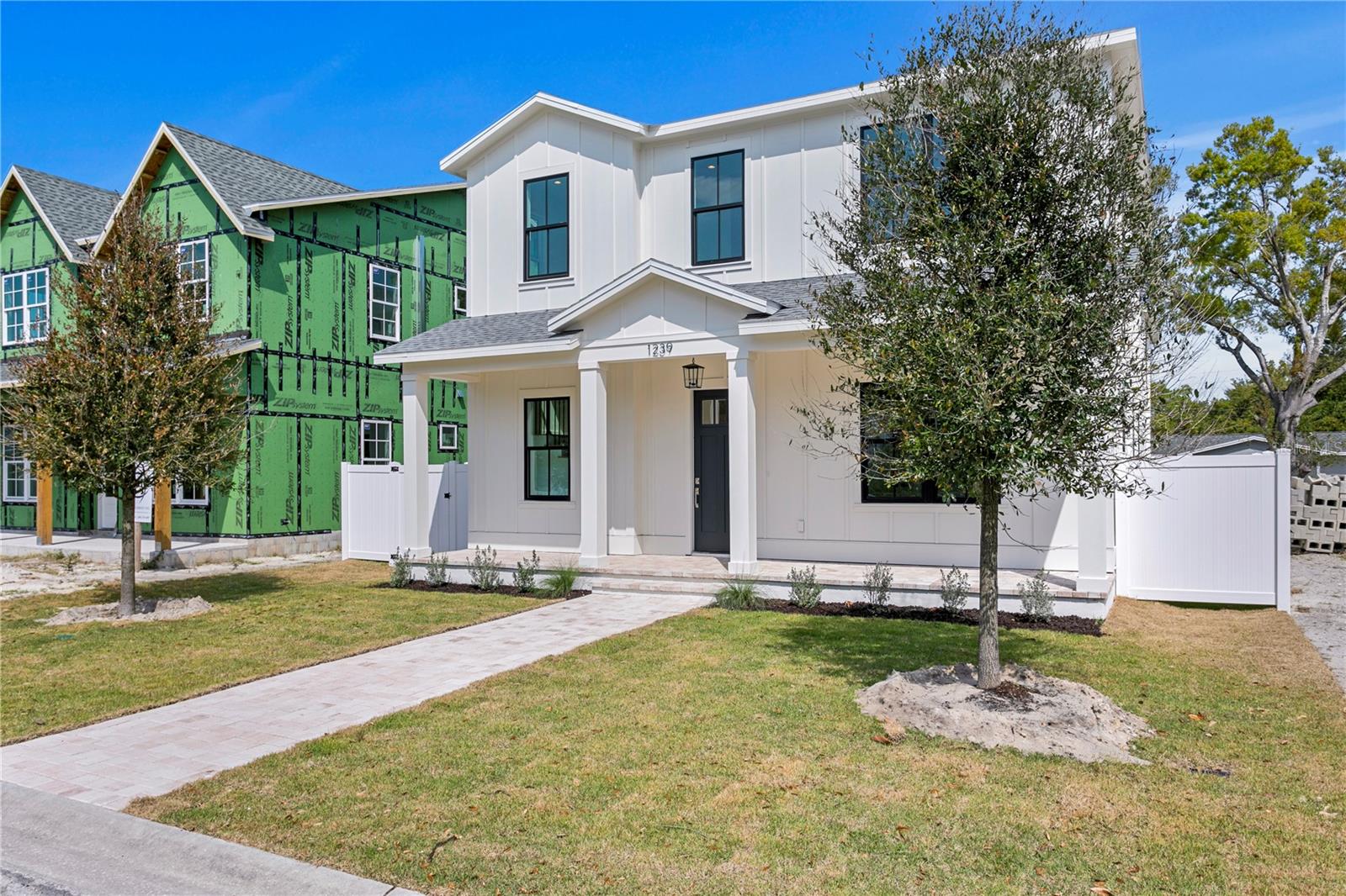 This New Build Luxury Home in a non-Flood zone area. Moving Ready with garage an ADU. The house consists of 5 Bedrooms + 4 Full Bath + Detach ADU with private entrance, 2 Car Garage and 1 parking space. This new construction house is 1 of 3 new houses that are being built by our experienced team on this street. This house features include desirable open floor plan with 10' Ceilings on the first floor & 9' Ceilings on the 2nd floor, Impact Resistant windows, 8' Logan Style Interior Doors, Board and Batten Hardie siding, Mud room, gas stove, Tankless Gas Water Heater, Laundry room, Dining room and cafe.
