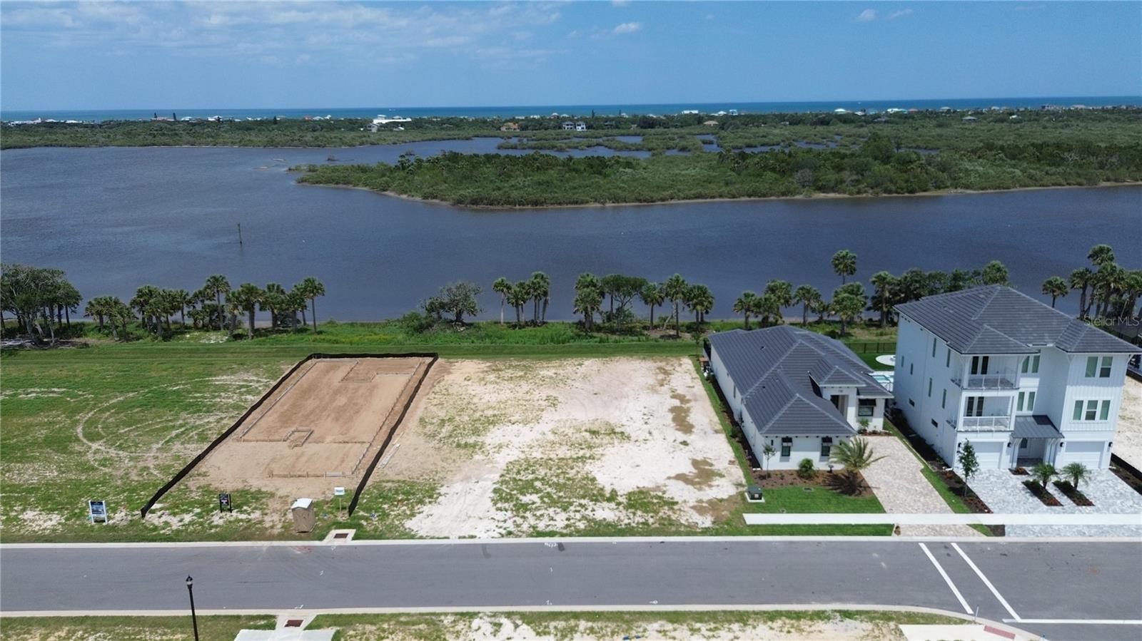 Create and build your luxury home in the new Veranda Bay community of Flagler Beach! This exceptional, ready-to-build homesite offers a rare opportunity to own a piece of the Intracoastal Waterway in a premier gated community. Already cleared and filled, this parcel provides a seamless start to constructing your dream home.
Veranda Bay is designed for a future-focused, resort-style lifestyle. Residents will enjoy an array of luxurious amenities, including a sparkling swimming pool, dedicated pickleball courts, dog park, fitness center, and an elegant clubhouse. With convenient access to St. Augustine, Daytona Beach, Orlando, and Jacksonville, you're perfectly positioned to explore the best of Florida. Seize this opportunity to build your custom home in Veranda Bay and embrace a life of unparalleled coastal luxury!