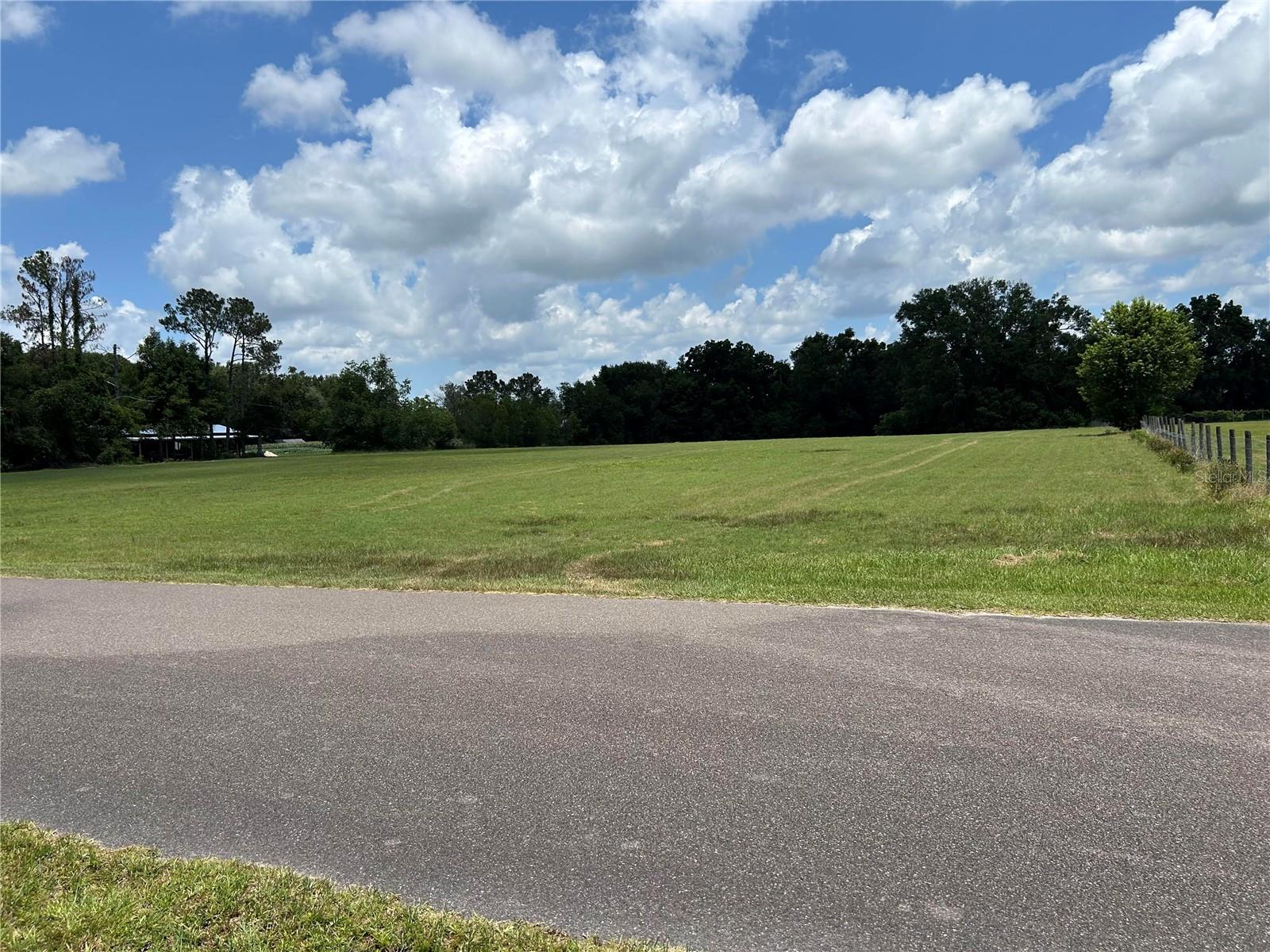 5.15 acres of vacant cleared land. This property is in an ideal location, being far enough from the hustle and bustle of town but is still just minutes from the schools and stores. This lot is perfect for building your dream home and has NO HOA. Come see your future peaceful and tranquil spot today.