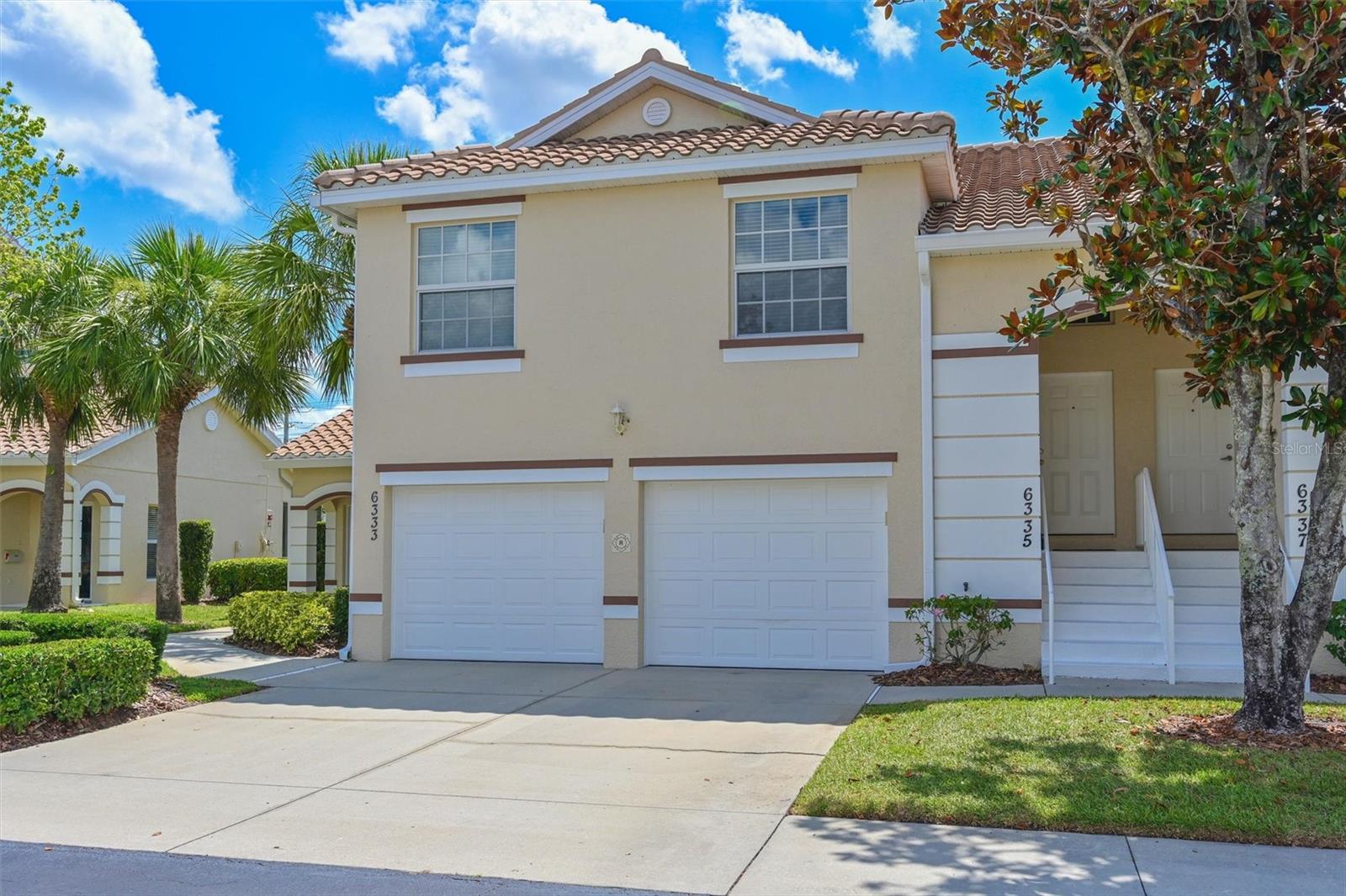 Terrific condo located in the highly sought-after Cypress Strand community of Tara Preserve! This spacious home features an open floorplan with the kitchen overlooking the spacious living room. The kitchen has abundant cabinet space and bar stool seating. Enjoy indoor-outdoor living with sliding glass doors in both the living room and the primary bedroom that open to a large, covered, and screened-in lanai—perfect for relaxing or entertaining year-round. The primary suite includes a walk-in closet and private access to the lanai, while the second bedroom is conveniently located at the front of the condo, offering privacy for guests. A versatile office/den provides the option to create a third bedroom or flex space. An attached one-car garage has additional storage space. Community amenities include a clubhouse, community pool and spa, and tennis courts. Internet and cable TV, including HBO is included in your fees. Ideally located just minutes from I-75, you’ll enjoy easy access to Sarasota, St. Petersburg, and Tampa.