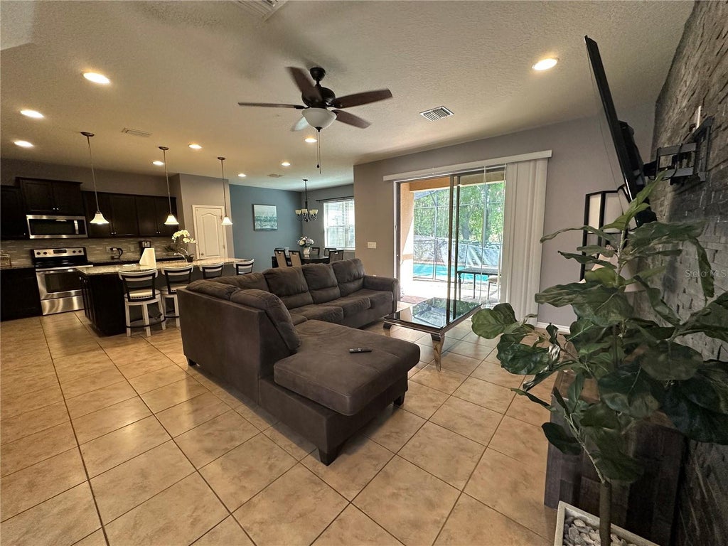 Photo of 1869 Nice Court, Kissimmee, FL 34747 (MLS # O6441421)