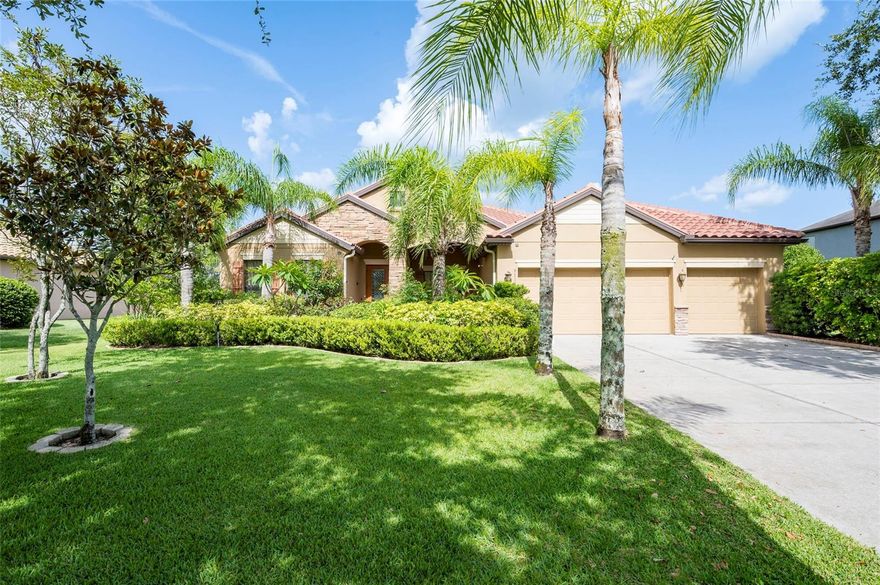 Step into this stunning 5-bedroom, 3-bathroom residence nestled on a spacious half-acre lot in the highly sought-after gated community of Toulon. This beautifully maintained home boasts curb appeal with a large, professionally landscaped yard and a classic Spanish tile roof. Inside, you’ll find an immaculate interior featuring elegant ceramic tile and rich hardwood floors throughout.

The thoughtfully designed floor plan includes a spacious kitchen with stone countertops, ample cabinetry, and a large island—perfect for entertaining. The home offers multiple living spaces including a cozy family room and a formal living room, ideal for both relaxing and hosting guests.

Retreat to the luxurious master suite complete with a spa-like bathroom featuring a garden tub, separate walk-in shower, and dual walk-in closets. The additional bedrooms are generously sized and filled with natural light.

Enjoy Florida living at its best on the screened-in lanai overlooking the expansive backyard. Other features include a 3-car garage, an irrigation system powered by a private well, and sidewalks throughout the community. The A/C unit was replaced in 2020 for added peace of mind.

Best of all, this home comes with NO CDD fees and offers unbeatable convenience—just 3.2 miles from I-75 and 4 miles from I-4, making your daily commute a breeze.