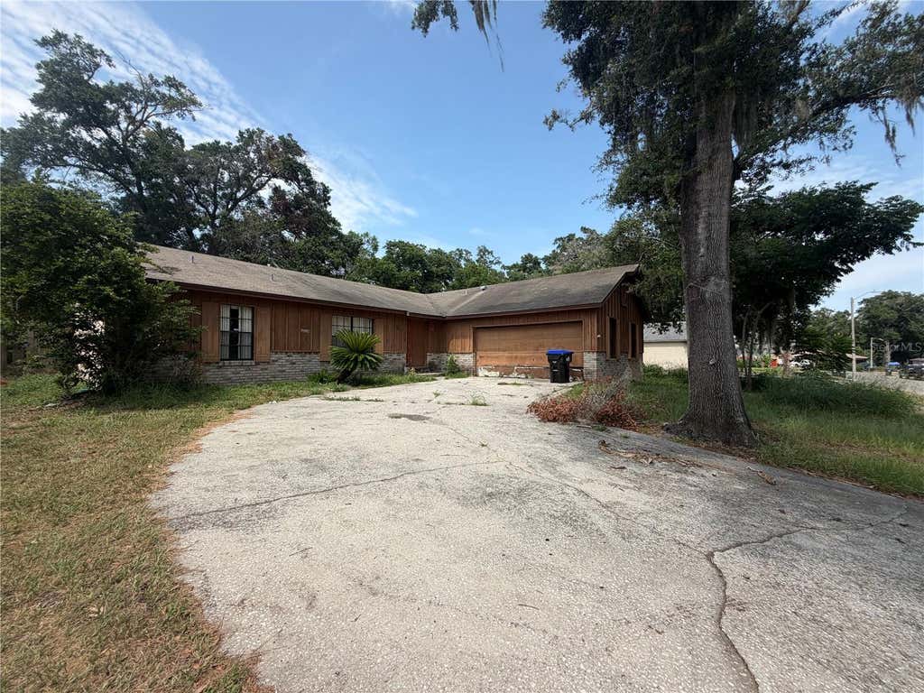 Photo of 6234 Sparling Hills Circle, Orlando, FL 32808 (MLS # O6431109)