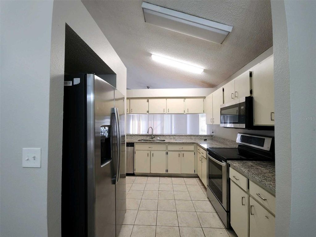 Photo of 8710 Triple Oaks Road, Temple Terrace, FL 33637 (MLS # O6398871)