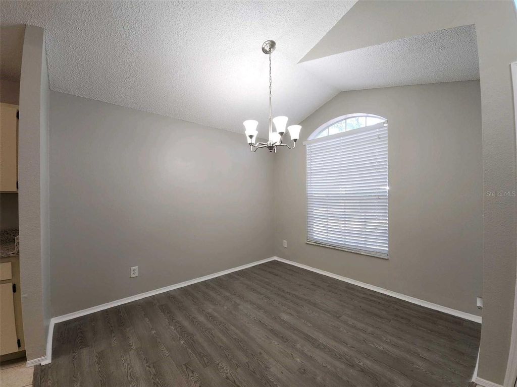 Photo of 8710 Triple Oaks Road, Temple Terrace, FL 33637 (MLS # O6398871)