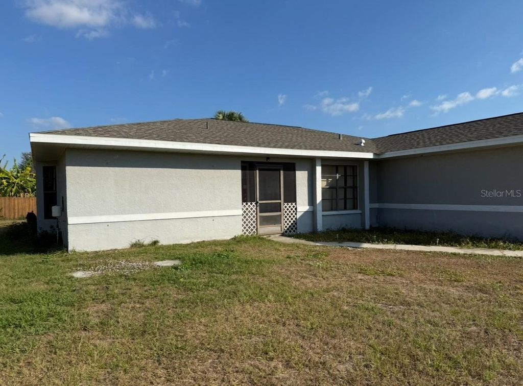 Photo of 113 Lenoir Street NW, Port Charlotte, FL 33948 (MLS # TB8433109)