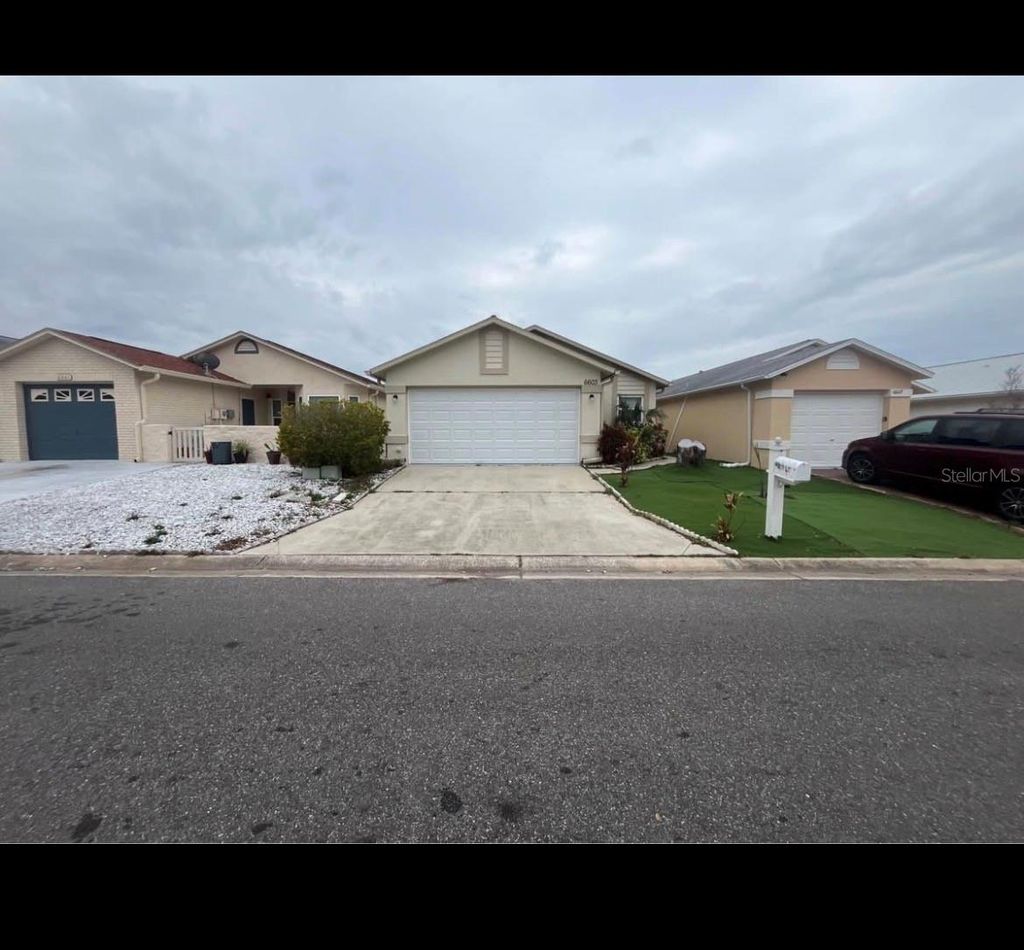 Photo of 6603 Crossbow Lane, New Port Richey, FL 34653 (MLS # TB8466051)