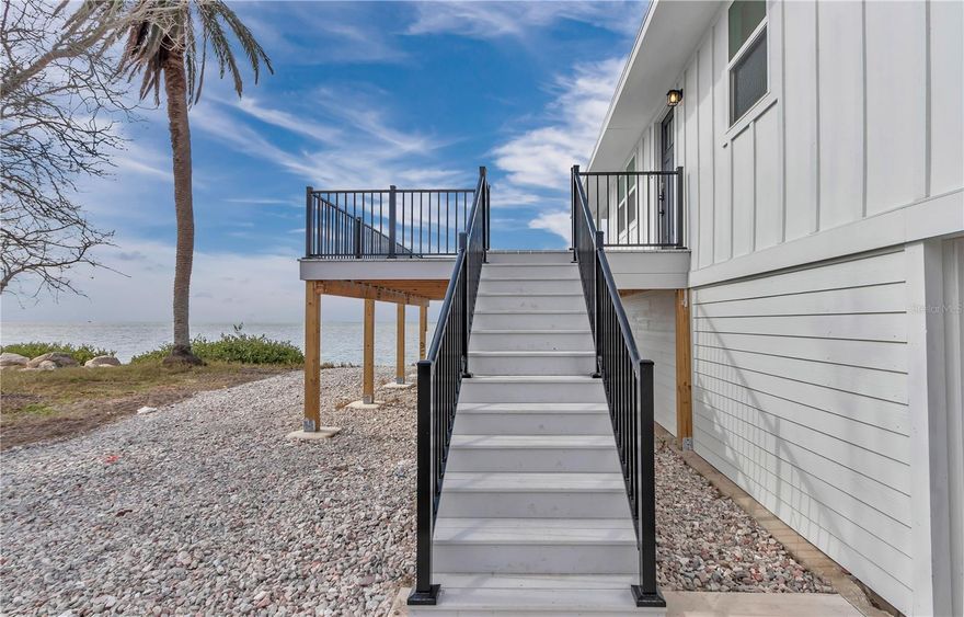 Gulf Front GEM!!  Welcome to your slice of paradise! Your new life awaits you off the water in Hudson Florida. This beautifully refreshed remodel is a 3 bedroom, 1 bath home offering over 900 sqft of living space. This home offers stylish coastal living right on the Gulf of America. 
Step out onto the expansive deck and take uninterrupted panoramic water views- the best lot in town for breathtaking sunsets and tranquil mornings. Every inch of this home and has been thoughtfully updated inside and out, blending modern finishes with relaxes seaside charm. 
Enjoy views from both the kitchen and the living space of the water. The kitchen has plenty of entertaining space with an island and bar seating. This home is ready for its next owner with a new roof, brand new windows and sliders, new exterior deck and siding along with new flooring and tile. This house is more than a fresh coat of paint! It's practically brand new! 
Whether you're looking for a full time residence, a vacation retreat, or an investment opportunity, this property delivers! With direct Gulf access, low maintenance design and prime location. 
Don't miss your chance to own a rare Gulf Front property that checks all the boxes.