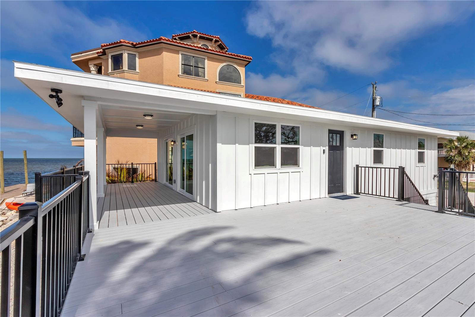Gulf Front GEM!! Welcome to your slice of paradise! Your new life awaits you off the water in Hudson Florida. This beautifully refreshed remodel is a 3 bedroom, 1 bath home offering over 900 sqft of living space. This home offers stylish coastal living right on the Gulf of America.
Step out onto the expansive deck and take uninterrupted panoramic water views- the best lot in town for breathtaking sunsets and tranquil mornings. Every inch of this home and has been thoughtfully updated inside and out, blending modern finishes with relaxes seaside charm.
Enjoy views from both the kitchen and the living space of the water. The kitchen has plenty of entertaining space with an island and bar seating. This home is ready for its next owner with a new roof, brand new windows and sliders, new exterior deck and siding along with new flooring and tile. This house is more than a fresh coat of paint! It's practically brand new!
Whether you're looking for a full time residence, a vacation retreat, or an investment opportunity, this property delivers! With direct Gulf access, low maintenance design and prime location.
Don't miss your chance to own a rare Gulf Front property that checks all the boxes.