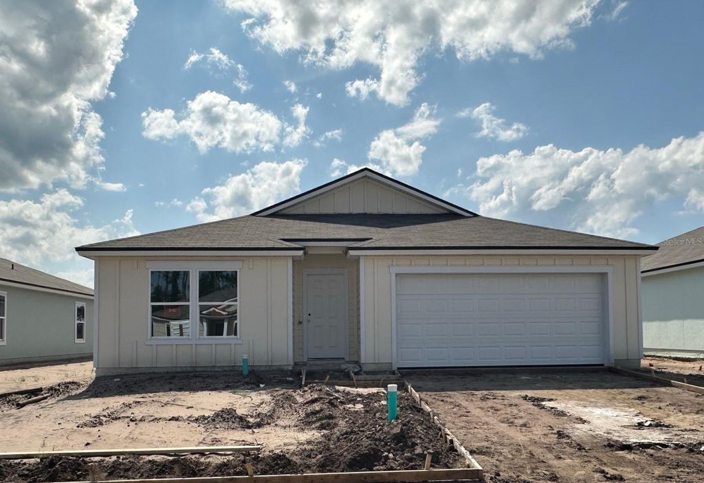 Photo of 95 Hulett Woods Road, Palm Coast, FL 32137 (MLS # FC300247)