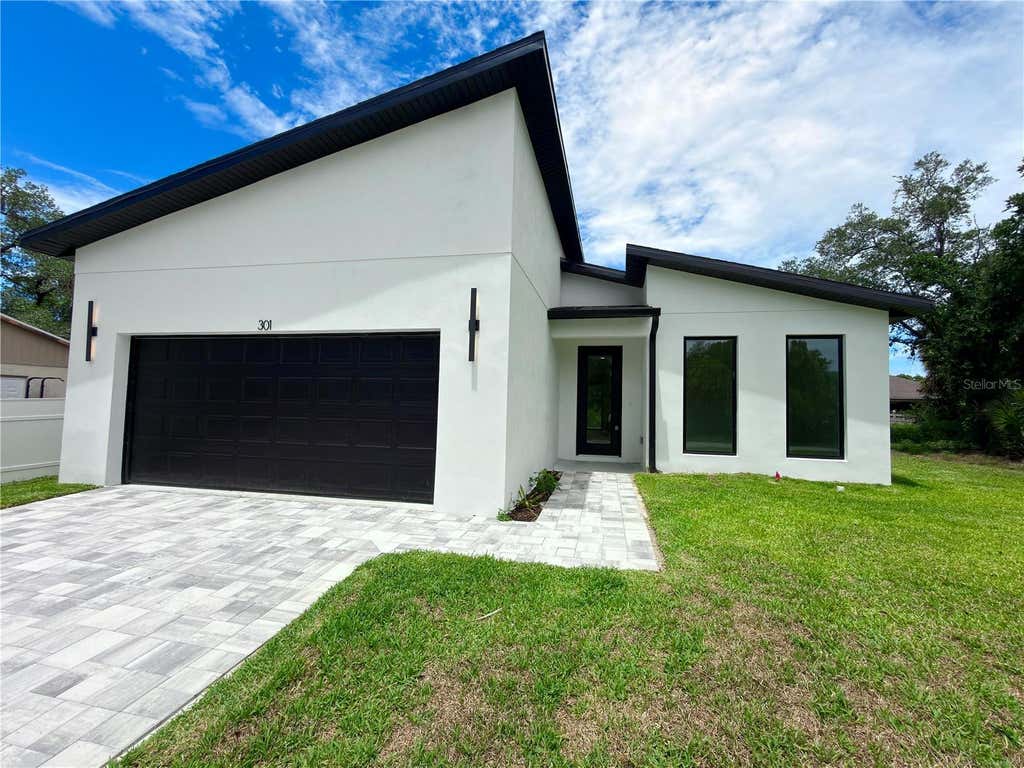 Photo of 301 Eppinger Drive, Port Charlotte, FL 33953 (MLS # O6410234)