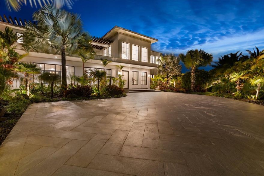 Behind the gates of this private compound lies an architectural masterpiece spanning nearly an acre and over 17,000 square feet of total construction. The property features a 6-bedroom main residence, two guest houses, a private gym, and a professional USTA-approved tennis court. Designed across three contiguous lots, the estate blends soaring ceilings, imported finishes, and seamless indoor-outdoor living. Every detail is bespoke from the hand-shaped brass staircase by an Italian master craftsman to exclusive marble finishes not found elsewhere on the island. Expansive terraces, a show-stopping kitchen with dual refrigerators and dishwashers, and a fully outfitted outdoor kitchen make the home ideal for entertaining. The layout ensures privacy and flow, connecting all structures with covered terraces and lush grounds. Built to Miami-Dade HVHZ standards, the home exceeds safety and construction codes while embracing Caribbean living at its finest. Private, yet perfectly located in the heart of Dorado Beach Resort & Club.